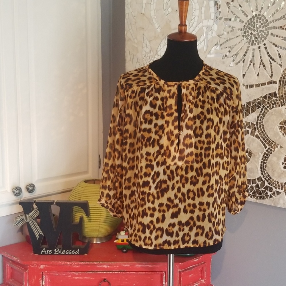 Jennifer Lopez cheetah print blouse